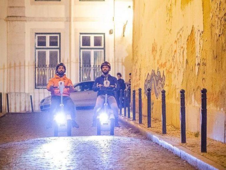 Nightriders Sitway Tour - Don’t be afraid of the dark and explore Lisbon on an exclusive Nightriders Sitway Tour!