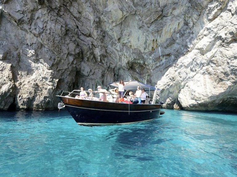 Capri boat tour with transfer - Meeting point at 7:00 am at Termini train station (Rome)* and departure with high-speed...
