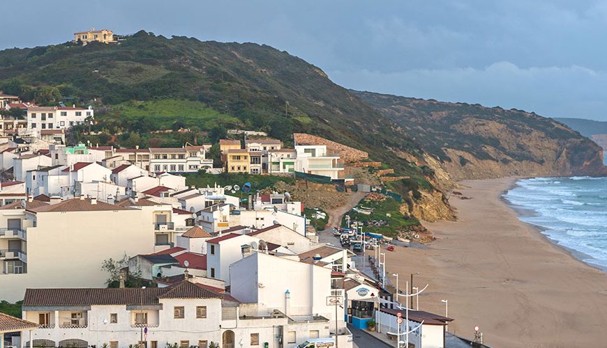 Attractions-in-Salema: Salema, Vila do Bispo, Algarve - visit this beautiful seaside village located on the southwestern coast of Portugal for stunning views, sandy beaches, fresh seafood, and a relaxed atmosphere. Enjoy hiking along the cliffs or simply lounging on the beach while soaking up the sun. It's the perfect destination for a peaceful and authentic Algarve experience.