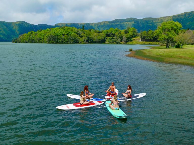 SUP Yoga • Sete Cidades - Stand Up Paddle Board Yoga classes start at the shore of the Blue Lake. We will distribute all...