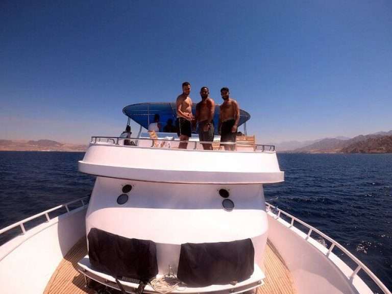 Group Boat Snorkeling and BBQ Lunch on Board in Aqaba - Embark on a memorable Group Boat Snorkeling and BBQ Lunch on...