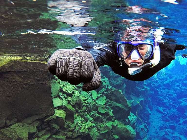 Above & Below: Silfra Snorkeling & Fly Over Iceland - with Snorkeling Photos - How about starting the day with snorkeling Silfra, a freshwater fissure and then "fly" around beautiful Iceland? Then we recommend the combination of Snorkeling and Fly Over Iceland adventure combo!