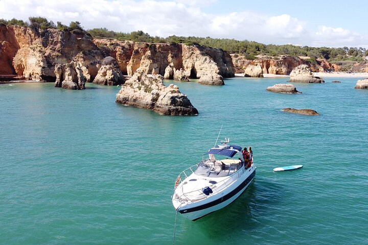 Morning Yacht tour from Lagos: Embark on an unforgettable adventure along the stunning coast of Lagos with our Half-Day Morning Yacht Tour. Experience the soothing embrace of the ocean breeze and indulge in breathtaking views of the Ponta da Piadade, Alvor Lagoon, and the charming coastal town of Burgau. This private charter excursion is the perfect way to start your day, combining relaxation, luxury, and natural beauty in one exceptional package