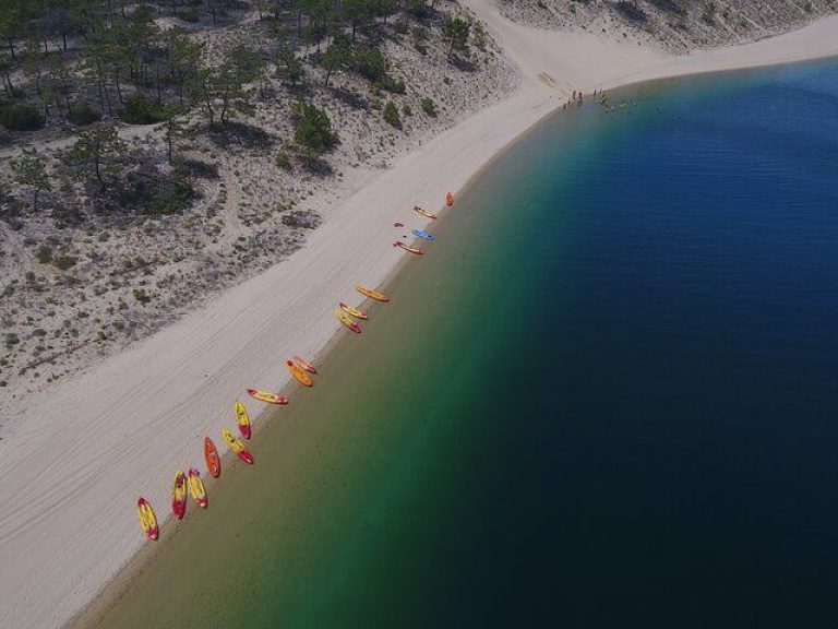 Sesimbra: Kayak on a Lagoon: Paddle on a Lagoon connect to the Atlantic ocean. Have a beach break on an empty beach.