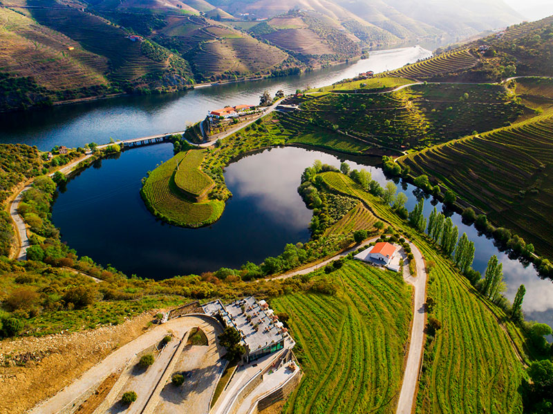 Nestled in the northern heartlands of Portugal, the Douro Valley is a breathtaking mosaic of terraced vineyards, ancient villages, and serpentine rivers. A region where time seems to slow, it is renowned not only for its world-class wines but also for its historical depth and natural splendors.
