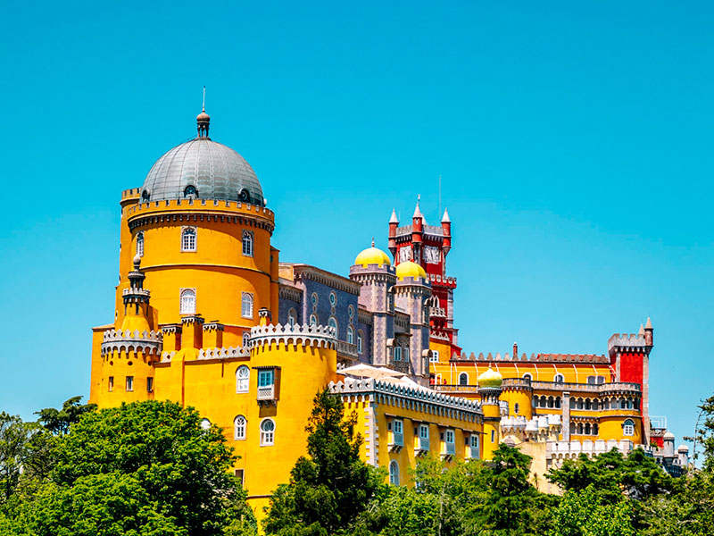Though not directly in Lisbon, a day-trip to the nearby town of Sintra is a must. Famous for its romantic 19th-century architecture, including the Pena Palace and Quinta da Regaleira, Sintra offers a magical experience that will leave you spellbound.