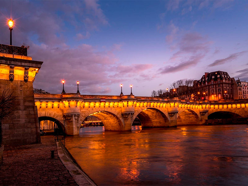 Immerse yourself in the romance and history of Paris by exploring the iconic Pont Neuf. As the city's oldest standing bridge, it invites visitors to step into a world that blends architectural elegance with cultural richness.