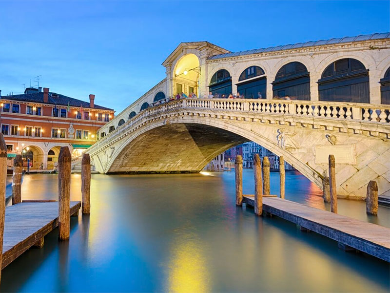 Discover the timeless allure of the Rialto Bridge, an architectural gem that stands as a symbol of Venice's rich history and culture.