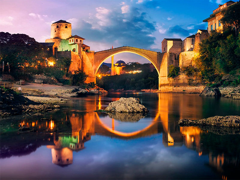 Standing gracefully over the serene waters of the Neretva River, the Stari Most, or Old Bridge, is a captivating architectural masterpiece that holds both historical significance and an enduring sense of unity. As one of Mostar's most iconic landmarks, this 16th-century Ottoman bridge is a living testament to the city's rich heritage and cultural fusion.