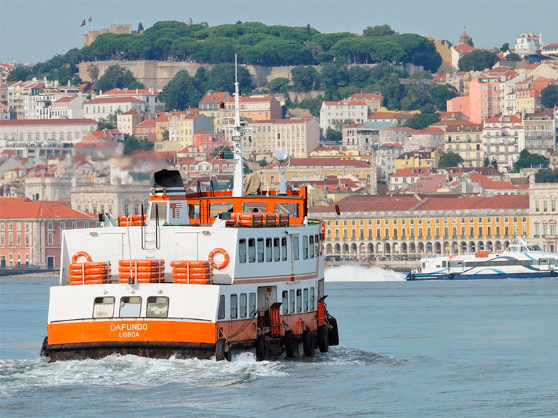 Lisbon Travel Guide: The city's public ferries are not only an essential form of transit for many locals, but they also offer some of the best views of Lisbon’s skyline. A short trip across the Tagus River can be a delightful experience, providing a unique perspective on sites like the Monument to the Discoveries and the Belem Tower.