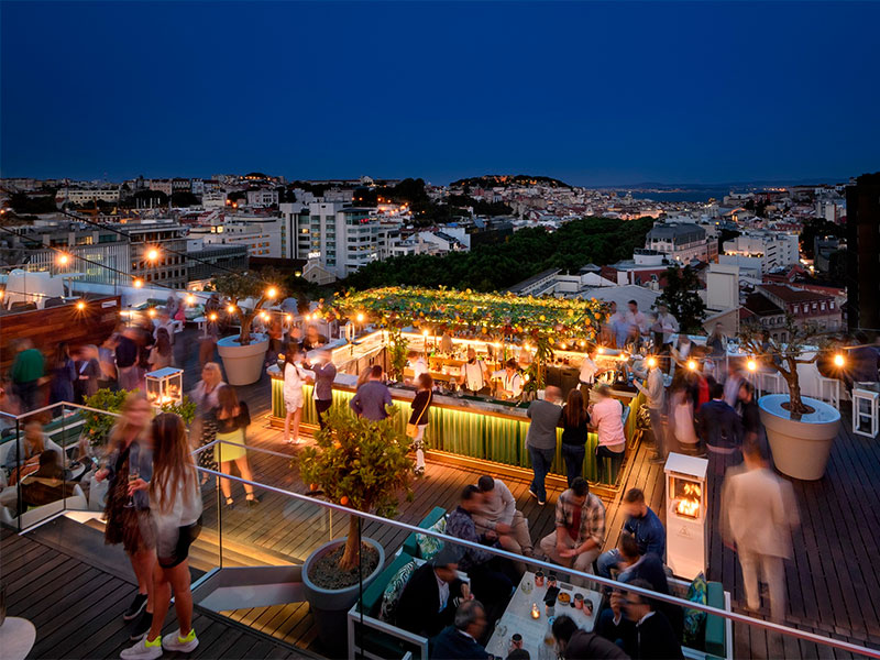 Lisbon Travel Guide: For those who prefer a more laid-back experience, Lisbon’s array of rooftop bars offer the perfect setting. With stunning views of the city's landmarks and the Tagus River, these venues are ideal for a romantic evening or a relaxed night out with friends. PARK Bar and Sky Bar are among the top choices for elevated nightlife experiences.
